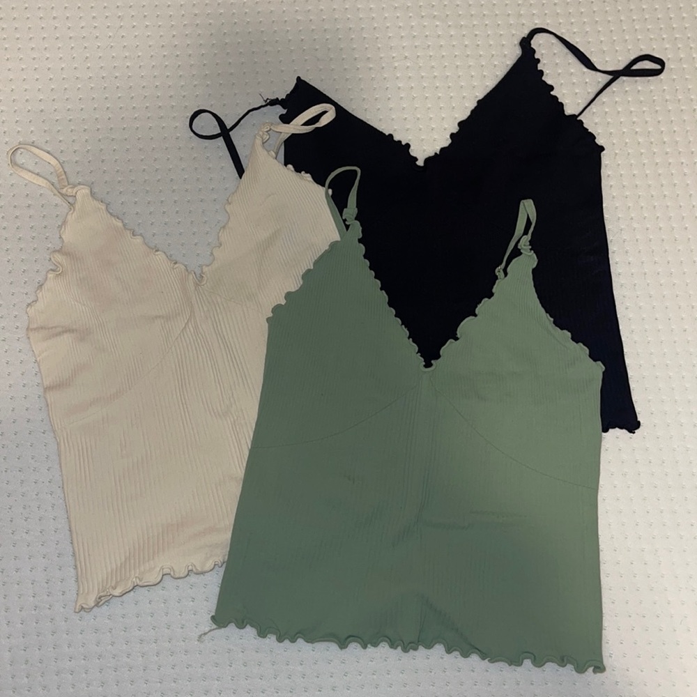 3 seamless free people tanks (black, cream, sage)
